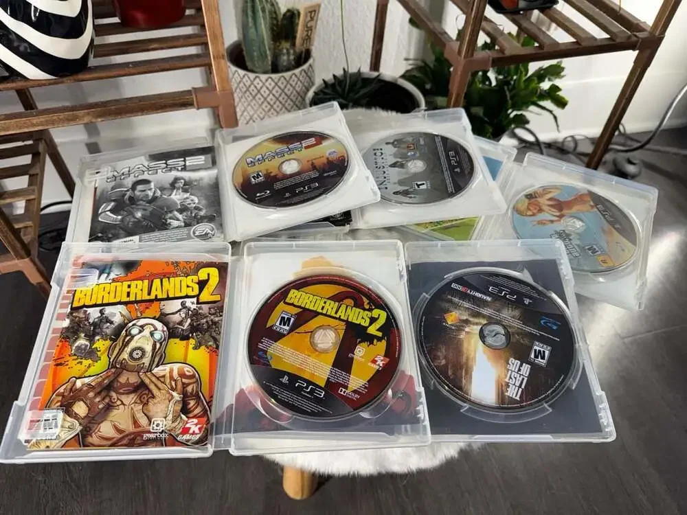 Sony PlayStation 3 Slim 160GB Console Bundle with Games and Controller